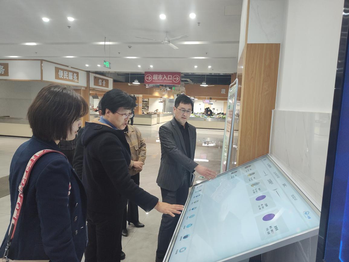 省商務廳流通處處長張遠琴來屯溪區調研農貿市場納統工作
